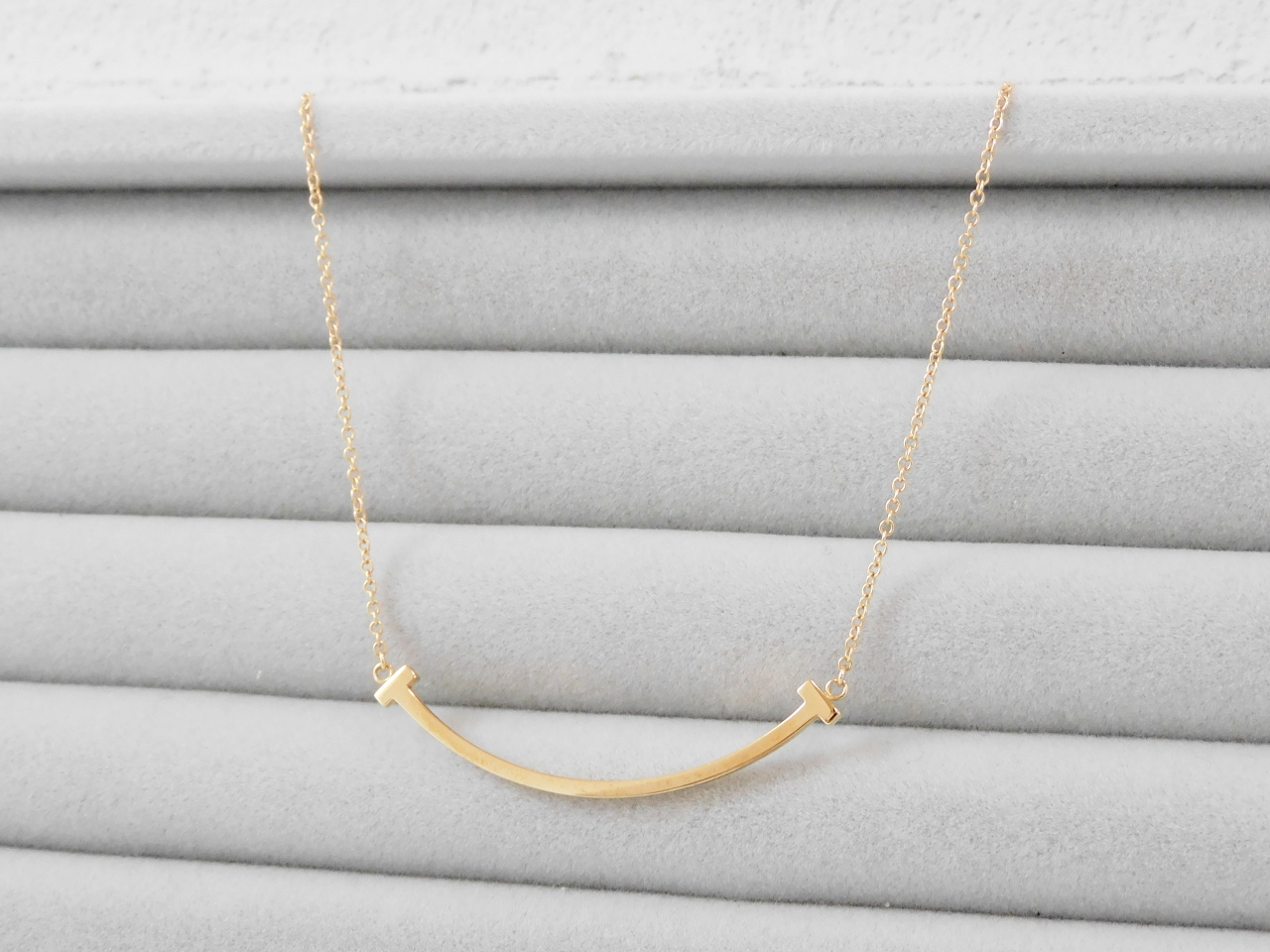 ティファニーT スマイルペンダント スモール 750RG｜郡山のまじめな  